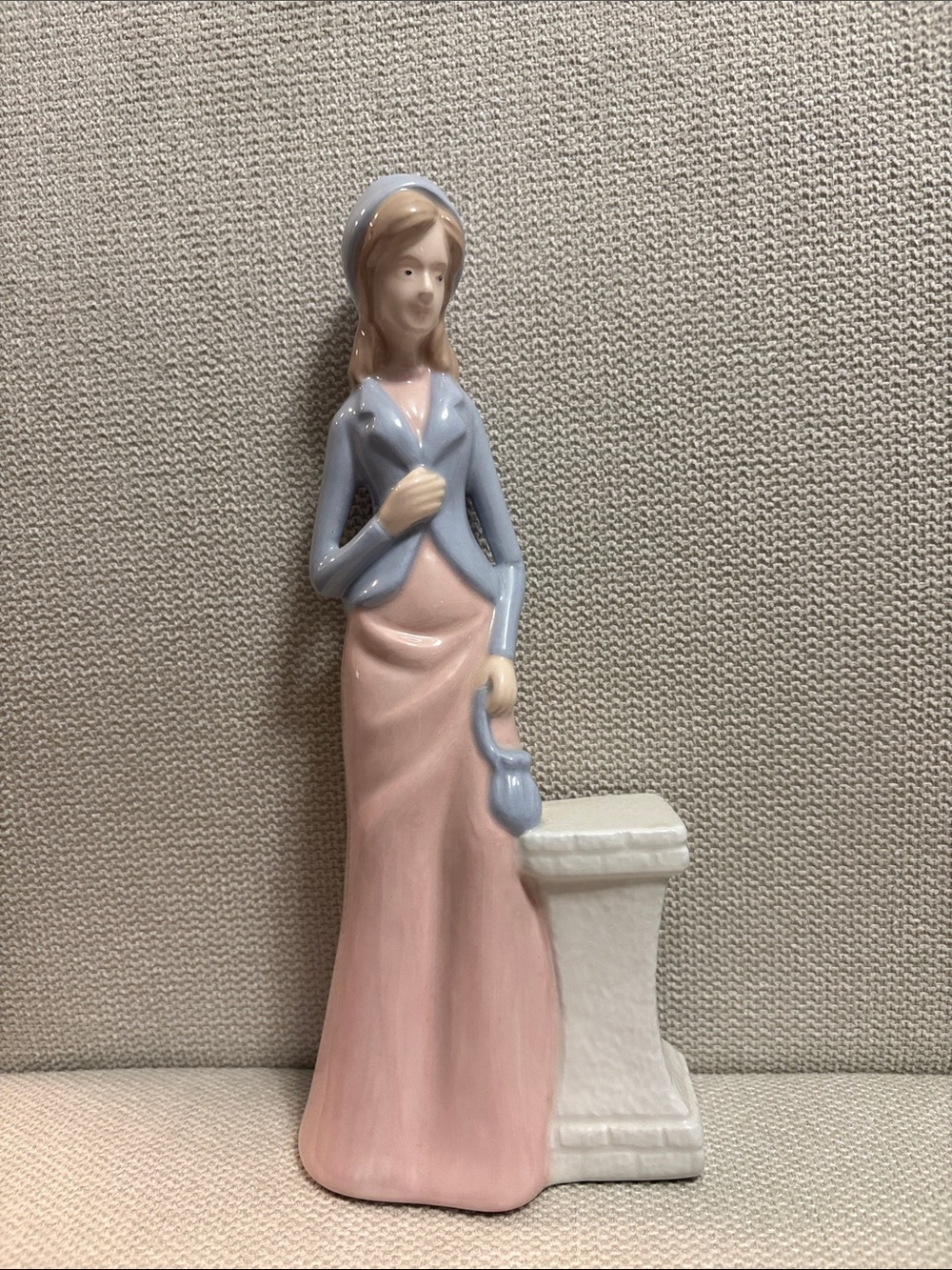 Elegant Ceramic Figurine in Light Blue and Pink
